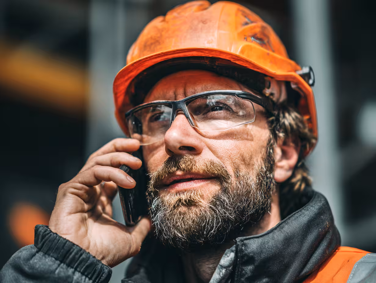 Industrial technician on the phone